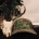 Squatch Branded Camo Hat beside Deer Skull