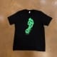 Squatch Branded Black Tshirt on table