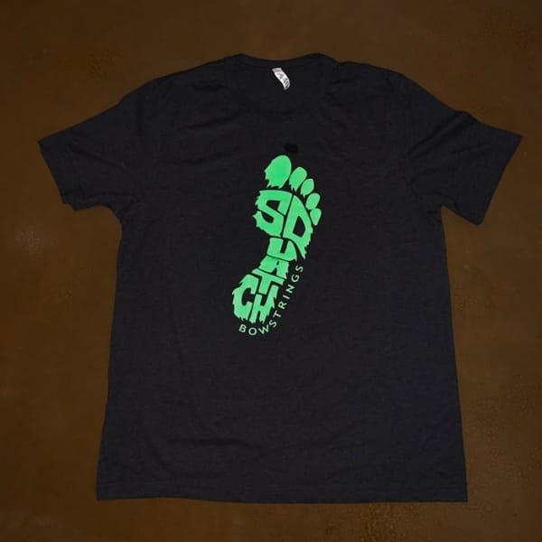 Squatch Branded Charcoal Tshirt on table